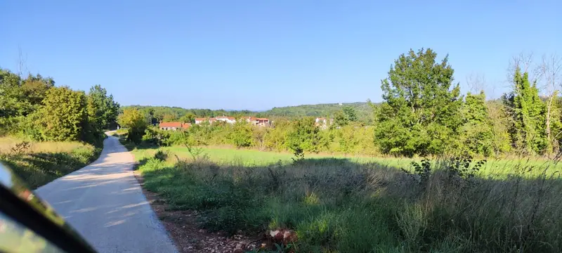 Gravel path through green countryside