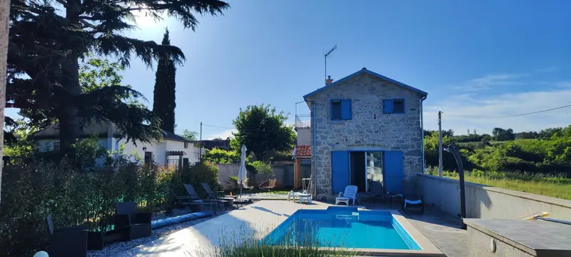 Villa Allegra: stone house with blue shutters and pool in the garden