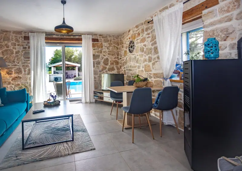Living and dining area with a view of the garden