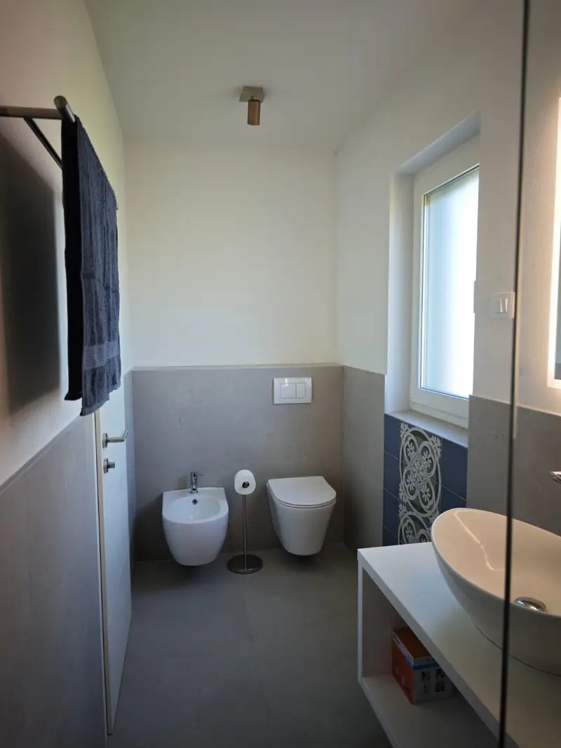 Bathroom with toilet and bidet