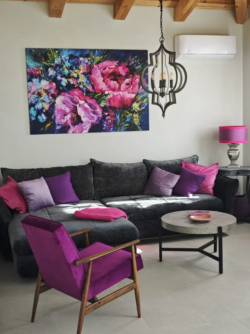 Seating area with armchairs and painting