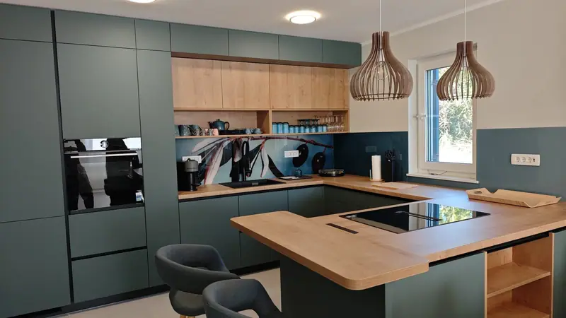 Kitchen with induction hob and wooden worktop